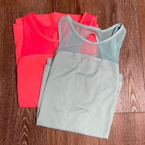 Two Fila sleeveless athletic tops size L